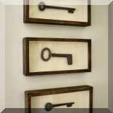 D27. Three framed oversized key shadowboxes. 